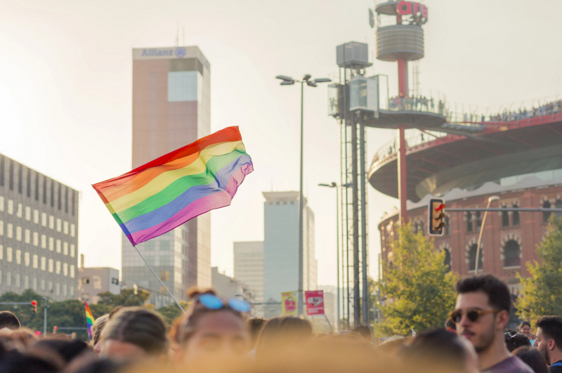 Pride flag waving at a parade