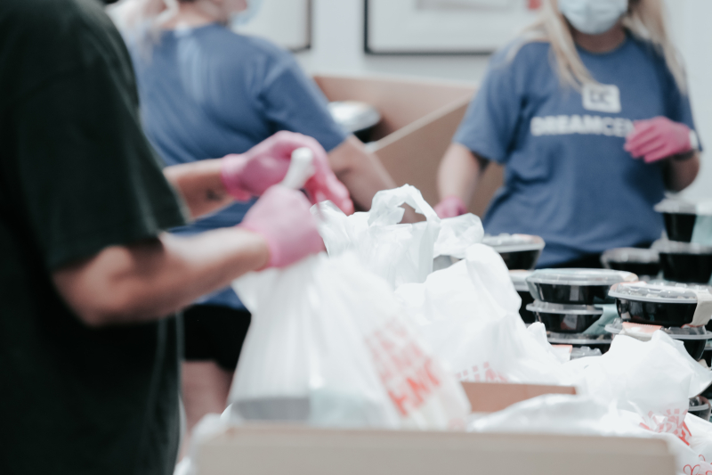 Man handling bags of food